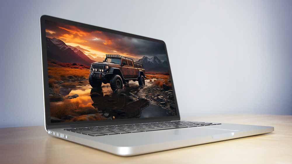 Fond d'écran gratuit HD 4K d'un véhicule tout-terrain noir à six roues garé sur un terrain rocailleux près d'un plan d'eau, avec des montagnes et un ciel couchant en arrière-plan.