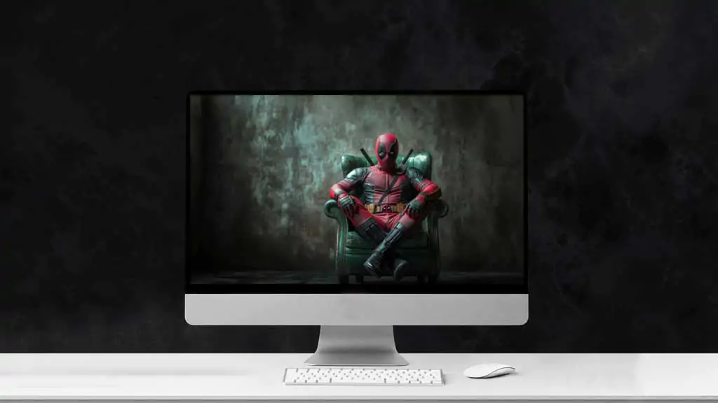 Deadpool armchair wallpaper 4k superhero seated in green leather armchair, available in Ultra HD resolution background for all devices