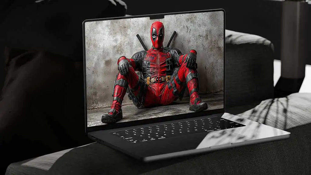 Deadpool wallpaper in 4K Ultra HD resolution, Marvel superhero sitting in his red and black suit against a textured wall. Available for desktop and mobile