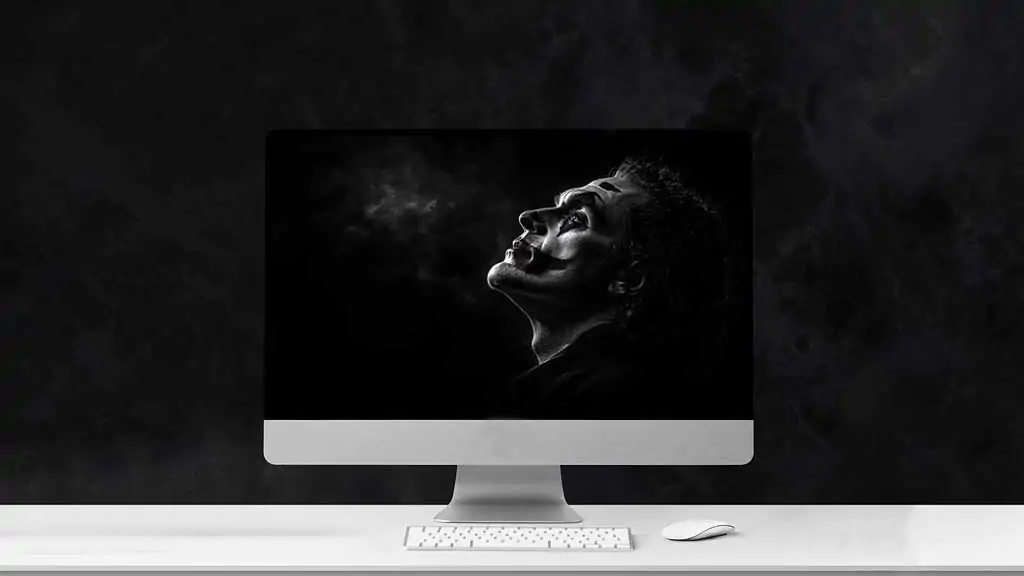 Joker Joaquin Phoenix Wallpaper 4K HD Free Download Dramatic black and white background for Desktop and Mobile