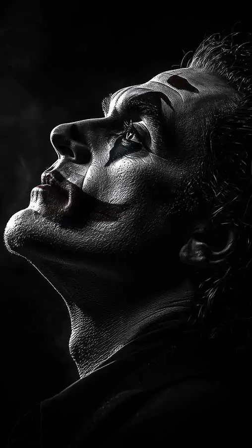 Joker Joaquin Phoenix Wallpaper 4K HD Free Download Dramatic black and white background for Desktop and Mobile