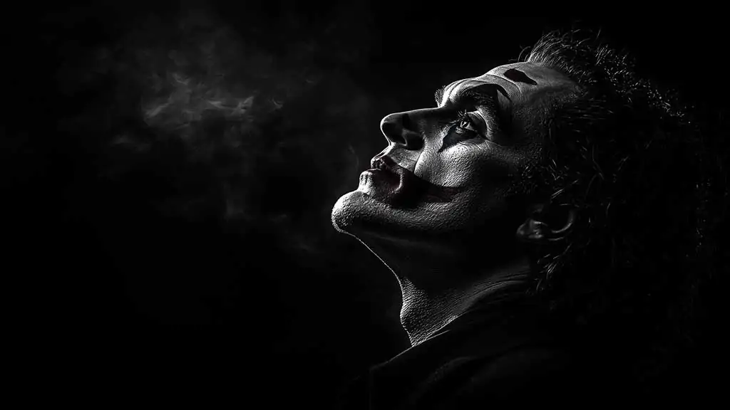 Joker Joaquin Phoenix Wallpaper 4K HD Free Download Dramatic black and white background for Desktop and Mobile