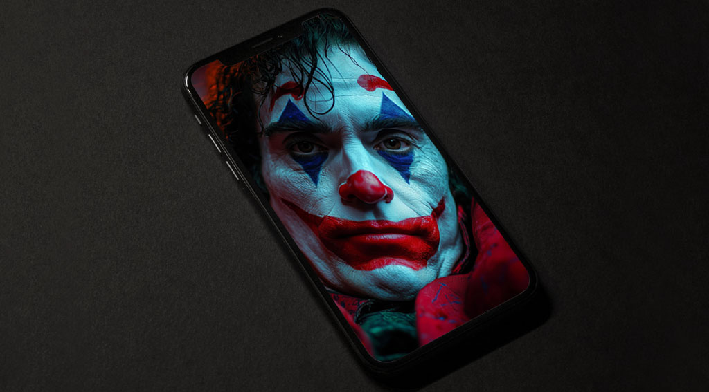 Fond d'écran 4K du portrait du Joker de Joaquin Phoenix | Gros plan cinématographique HD pour mobile Téléchargement gratuit