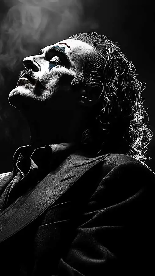 Artistic black and white Joker wallpaper featuring dramatic profile silhouette in suit with smoke effects, available in HD and 4K resolution