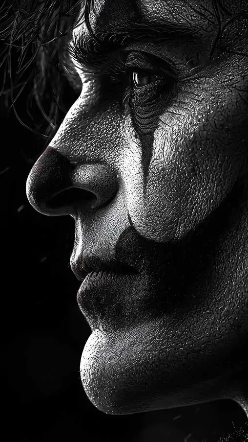 Download this dramatic black & white Joaquin Phoenix Joker profile wallpaper in 4K quality. Features stunning detail and lighting, for all device