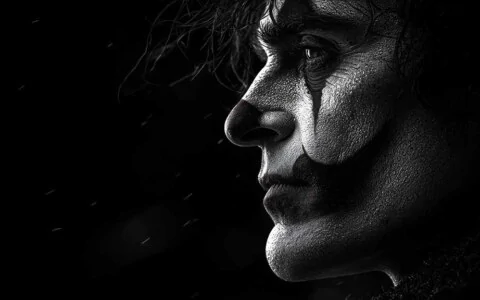 Download this dramatic black & white Joaquin Phoenix Joker profile wallpaper in 4K quality. Features stunning detail and lighting, for all device