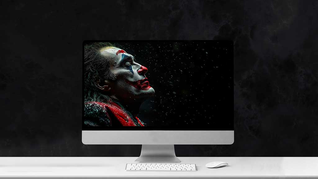 Fond d'écran gratuit Joaquin Phoenix Joker 4K en maquillage dramatique avec des flocons de neige, disponible en haute résolution Ultra HD pour ordinateur de bureau et mobile.