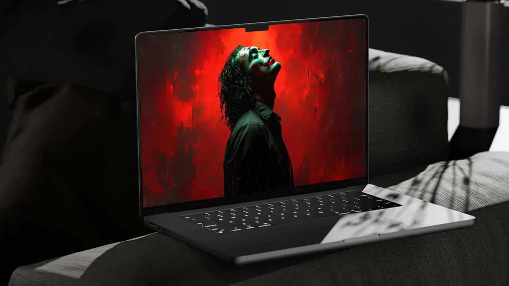 Joaquin Phoenix Joker wallpaper 4K ultra HD with red background and iconic character pose, in high-resolution desktop and vertical mobile