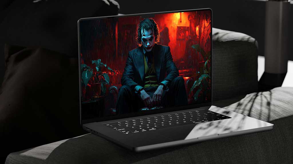Joker Joaquin Phoenix fond d'écran 4k assis dans une pièce sombre aux tons rouges et bleus, en haute résolution ultrq HD desktop et mobile