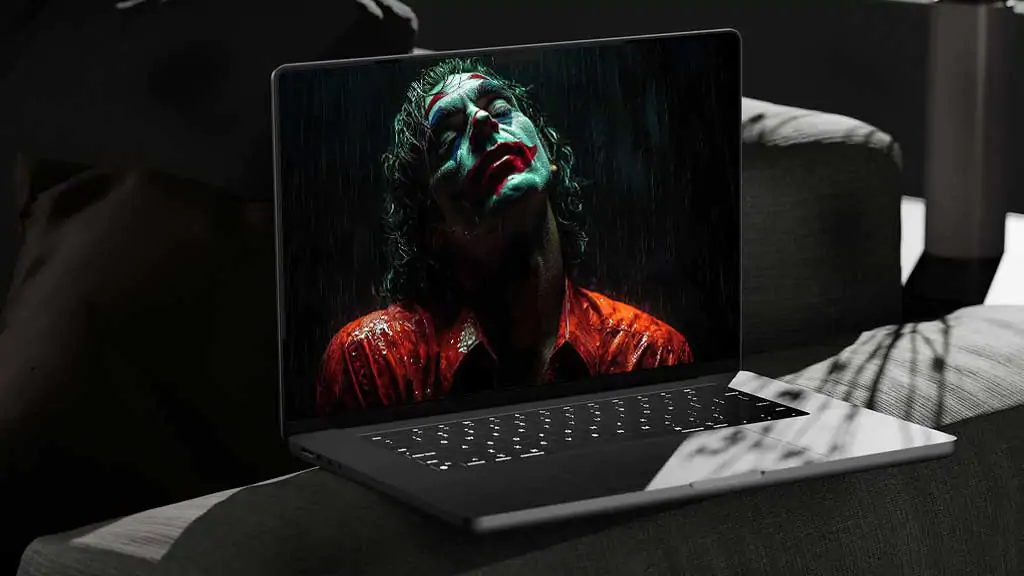 Free Joaquin Phoenix Joker wallpaper 4K in rain, with colors and emotional intensity, for pc and mobile in high resolution HD