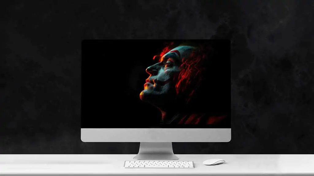 Joaquin Phoenix Free Joker wallpaper 4k dramatic orange and green lighting on his face, ultra HD for desktop and mobile