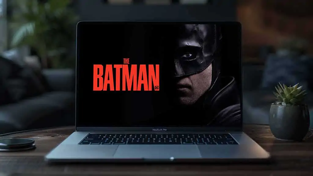 Batman face close-up 4K wallpaper showing Dark Knight mask with red title Ultra HD superhero background free download
