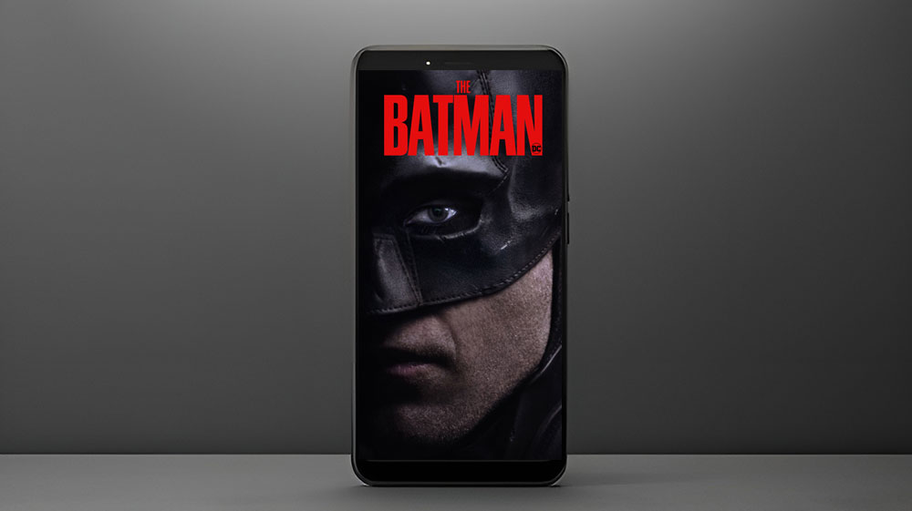 Batman face close-up 4K wallpaper showing Dark Knight mask with red title Ultra HD superhero background free download