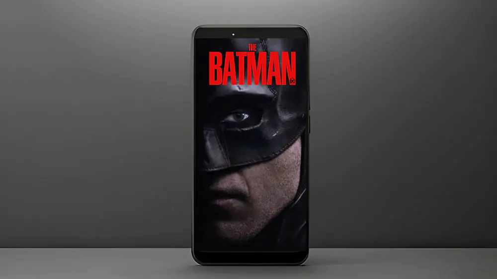 Batman face close-up 4K wallpaper showing Dark Knight mask with red title Ultra HD superhero background free download