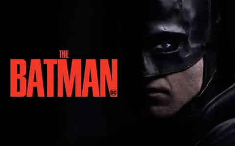 Batman face close-up 4K wallpaper showing Dark Knight mask with red title Ultra HD superhero background free download