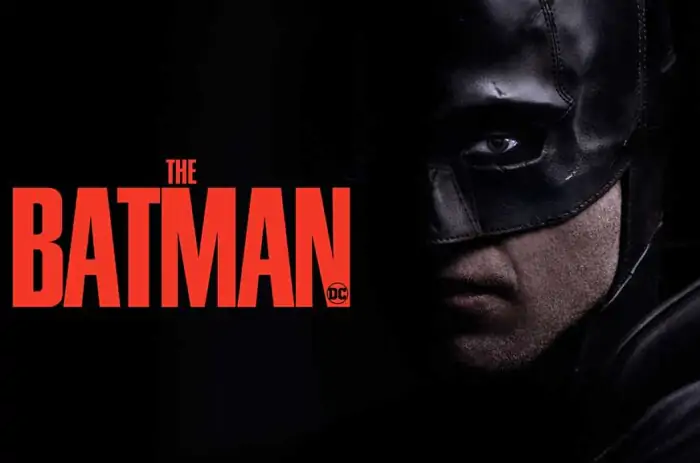 Batman face close-up 4K wallpaper showing Dark Knight mask with red title Ultra HD superhero background free download