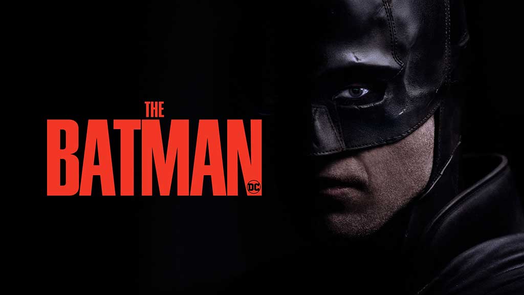 Batman face close-up 4K wallpaper showing Dark Knight mask with red title Ultra HD superhero background free download
