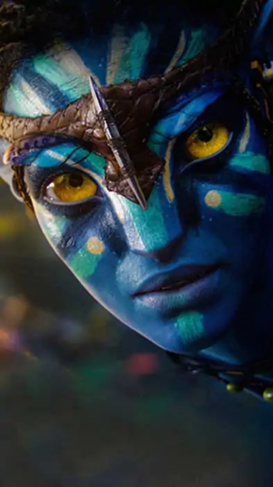 Avatar 4K HD movie poster wallpaper 4k showing close-up of blue Na'vi character with golden eyes and glowing skin patterns Free download