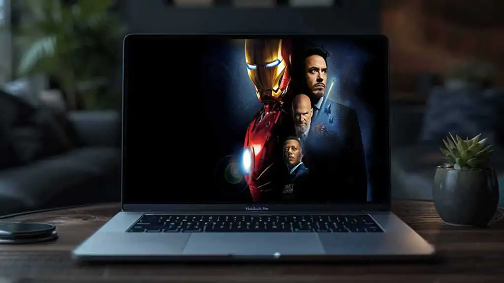 Iron Man 4K HD wallpaper featuring Tony Stark in red and gold armor with supporting characters from Marvel movies, available for free download