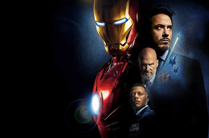 Iron Man 4K HD wallpaper featuring Tony Stark in red and gold armor with supporting characters from Marvel movies, available for free download
