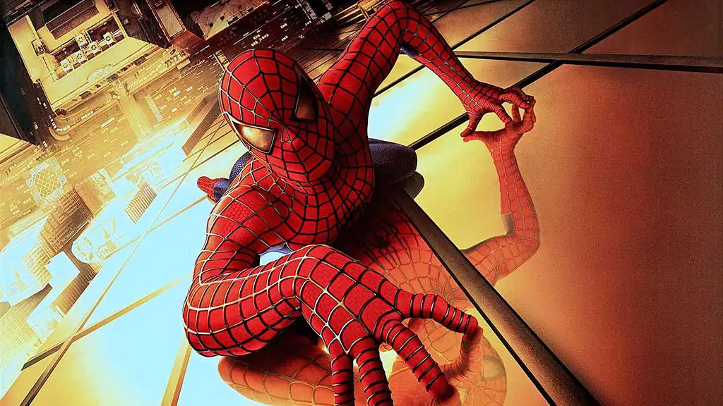 Spider-Man movie 4K wallpaper showing web-slinger swinging through New York City skyscrapers Ultra HD background Free