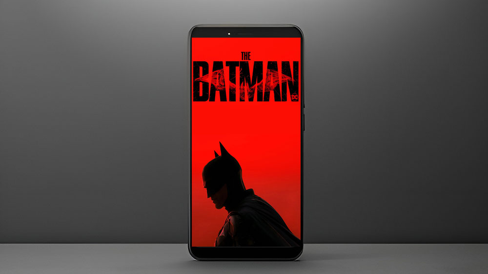 The Batman red logo 4K wallpaper showing Dark Knight silhouette with cracked title text ultra HD background free download