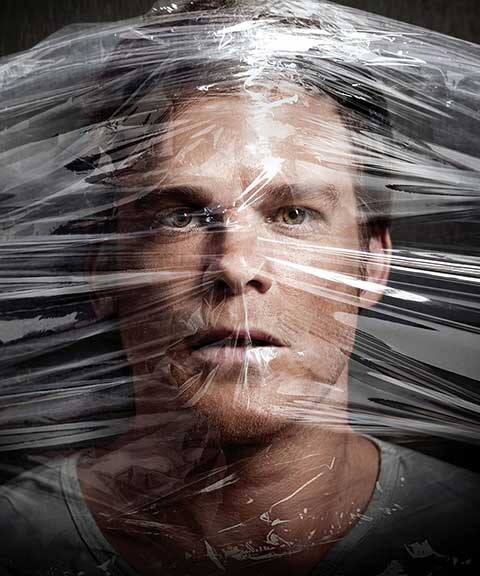 Dexter 4K wallpaper featuring TV series character with dramatic plastic wrap artistic effect and intense lighting against dark background